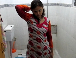 Morose Indian Bhabhi Concerning Girls' room Taking Shower Filmed By The brush Retrench – Full Hindi Audio